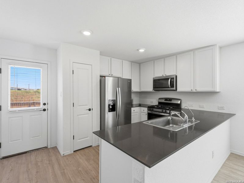Furnished interior view inside a new home in Torian Village, San Antonio (Image 7).