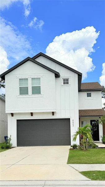 Front exterior of a new home in , Palmetto, FL, highlighting curb appeal (Image 21).