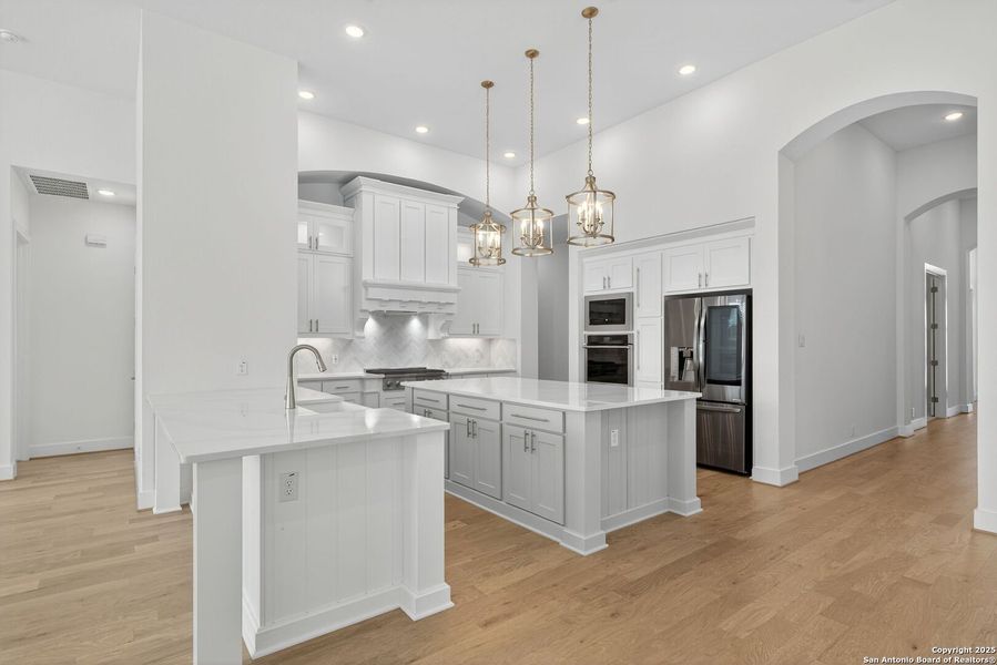 Furnished interior view inside a new home in Front Gate in Fair Oaks Ranch, Fair Oaks Ranch (Image 8). Furnished interior view inside a new home in Front Gate in Fair Oaks Ranch, Fair Oaks Ranch (Image 8).