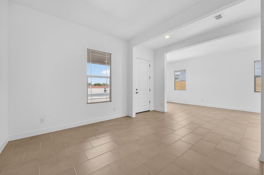 Spacious, unfurnished interior of a new home in Ellsworth Ranch, Queen Creek (Image 21).