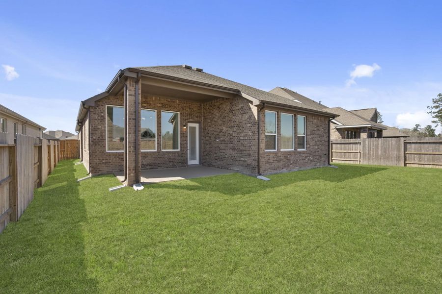 Exterior details and patio area of a home in The Trails, New Caney (Image 4). Exterior details and patio area of a home in The Trails, New Caney (Image 4).