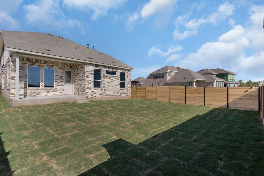 Exterior details and patio area of a home in Highland Village, Georgetown (Image 3).