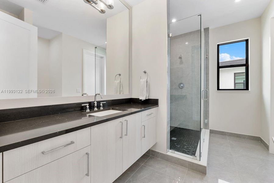 Furnished interior view inside a new home in Solana Bay at Avenir, Palm Beach Gardens (Image 45).