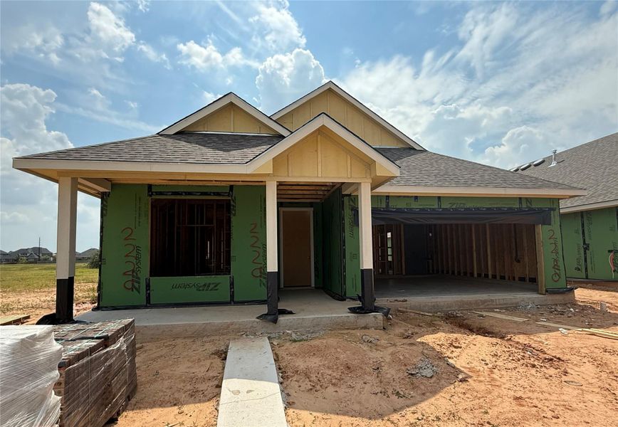 Front exterior of a new home in Sunterra 50s, Katy, TX, highlighting curb appeal (Image 2). Front exterior of a new home in Sunterra 50s, Katy, TX, highlighting curb appeal (Image 2).