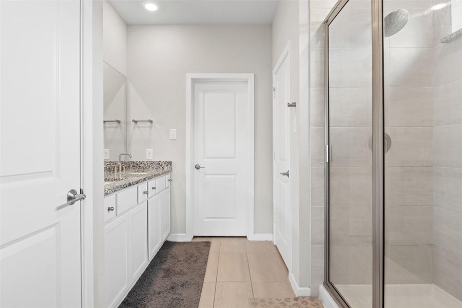 Primary bathroom, double vanity, walk in shower, walk in linen closet Primary bathroom, double vanity, walk in shower, walk in linen closet
