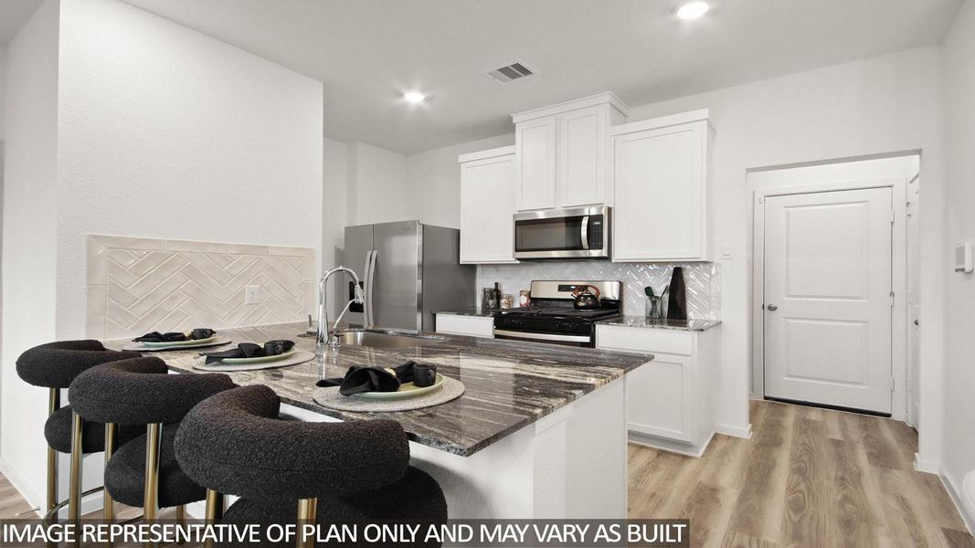 Furnished interior view inside a new home in Bridges on Lake Houston Villas, Humble (Image 4).