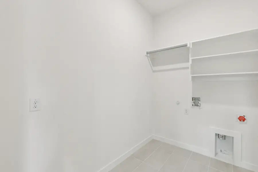 Utility Room in the Da Vinci II home plan by Trophy Signature Homes – REPRESENTATIVE PHOTO