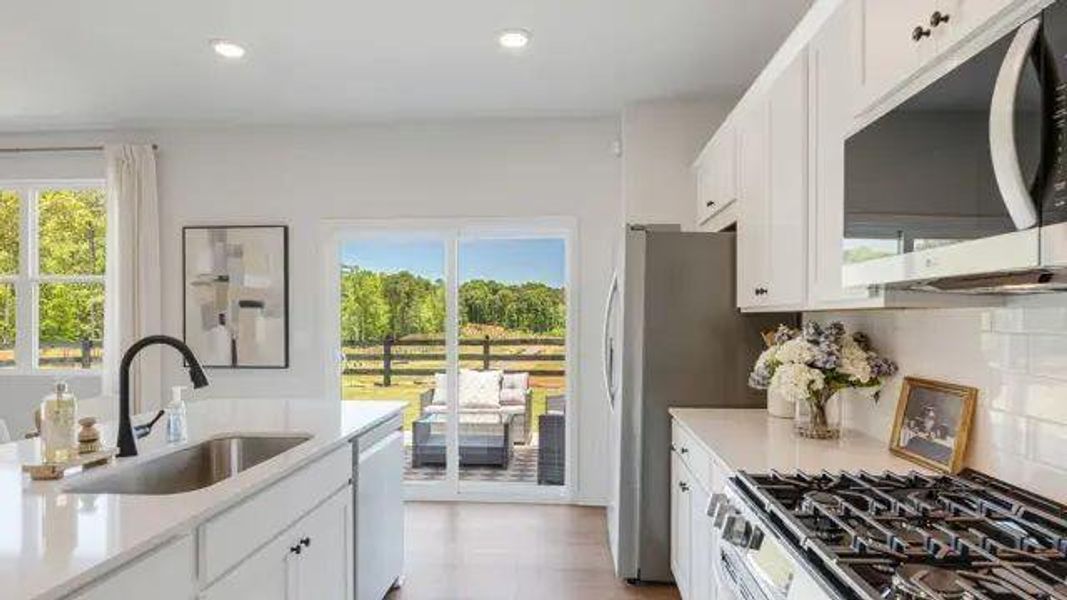 Furnished interior view inside a new home in Reserve at Gum Springs, Jefferson (Image 7).