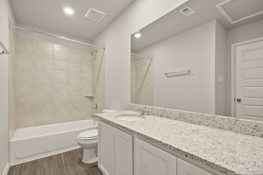 Furnished interior view inside a new home in Cinco Lakes, San Antonio (Image 6).