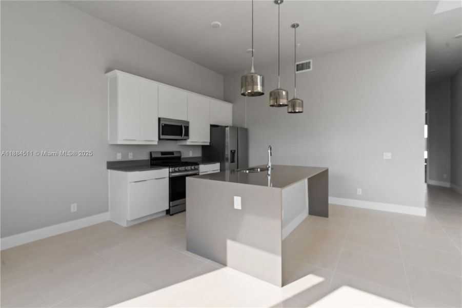 Furnished interior view inside a new home in , Reunion (Image 4). Furnished interior view inside a new home in , Reunion (Image 4).