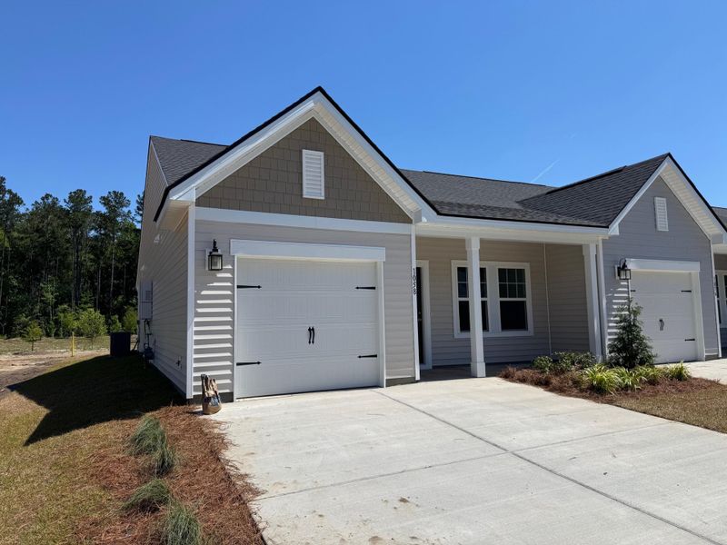 Front exterior of a new home in , Summerville, SC, highlighting curb appeal (Image 15).