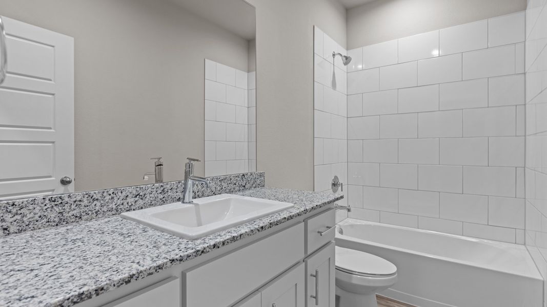 Representative furnished interior of a home built from the ROSEMONT by D.R. Horton in Homestead at Parks Bell Ranch, Odessa (Image 21).