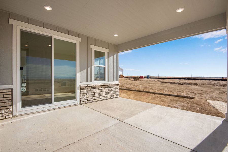 Exterior details and patio area of a home in The Aurora Highlands, Aurora (Image 4).