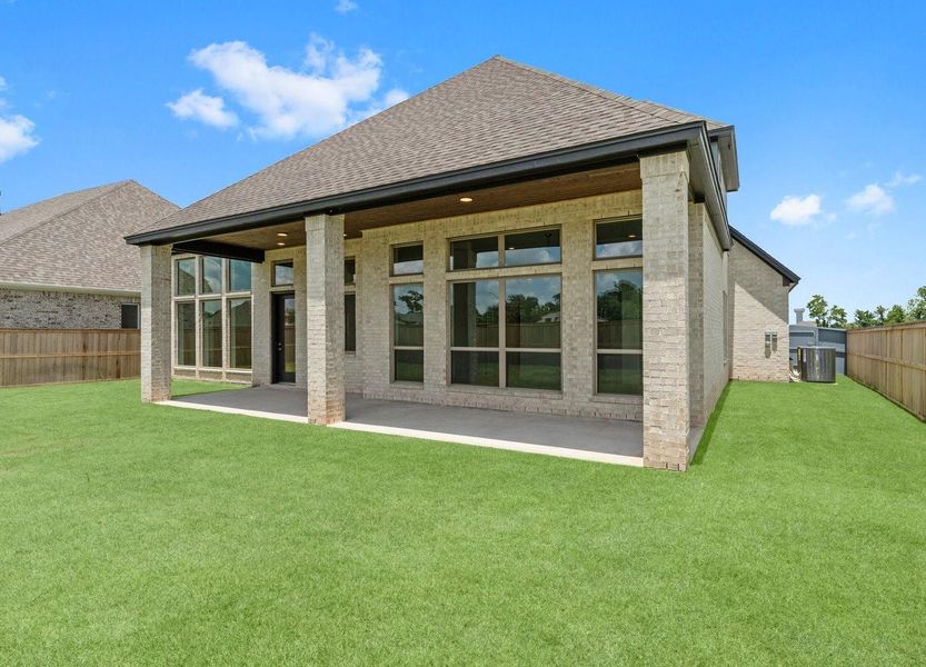 Front exterior of a new home in Fulshear Lakes 70’s, Fulshear, TX, highlighting curb appeal (Image 21). Front exterior of a new home in Fulshear Lakes 70’s, Fulshear, TX, highlighting curb appeal (Image 21).