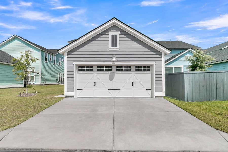 Front exterior of a new home in Carnes Crossroads, Summerville, SC, highlighting curb appeal (Image 30). Front exterior of a new home in Carnes Crossroads, Summerville, SC, highlighting curb appeal (Image 30).