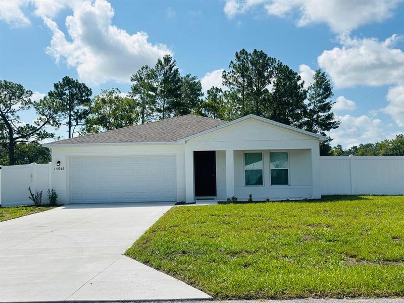Front exterior of a new home in Marion Oaks, Ocala, FL, highlighting curb appeal (Image 2).