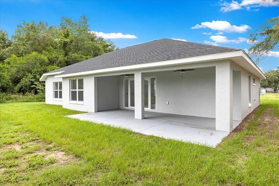 Exterior details and patio area of a home in , Summerfield (Image 23).