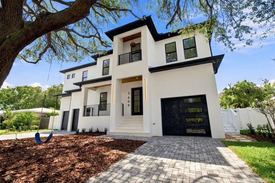 Front exterior of a new home in , Tampa, FL, highlighting curb appeal (Image 2). Front exterior of a new home in , Tampa, FL, highlighting curb appeal (Image 2).