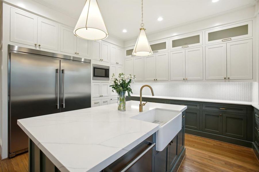 There are tons of cabinets and storage in this kitchen.