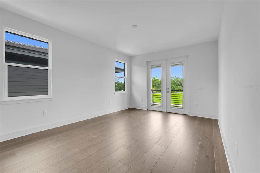 Spacious, unfurnished interior of a new home in Hampton Green at Providence, Davenport (Image 56).
