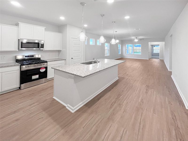 Oakshire II- Kitchen. Sample image for illustration; upgrades, options, and colors may vary. Oakshire II- Kitchen. Sample image for illustration; upgrades, options, and colors may vary.