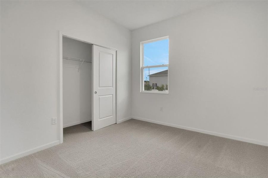 Spacious, unfurnished interior of a new home in Annabelle Estates, Winter Haven (Image 28).