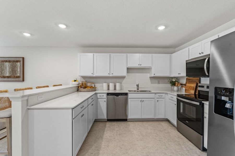 Representative furnished interior of a home built from the King by Holiday Builders in Poinciana, Poinciana (Image 7).