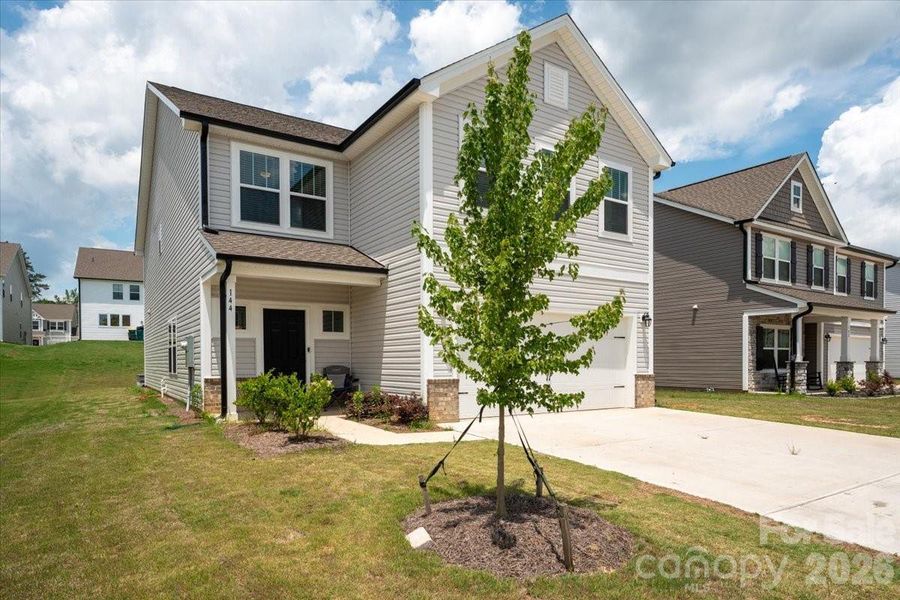 Front exterior of a new home in , Oakboro, NC, highlighting curb appeal (Image 28).