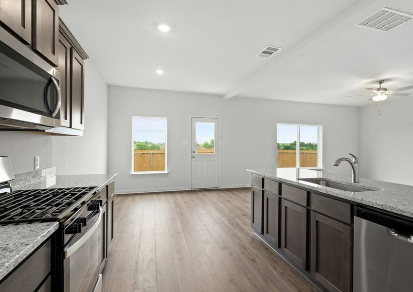 The dining room sits right off of the kitchen.