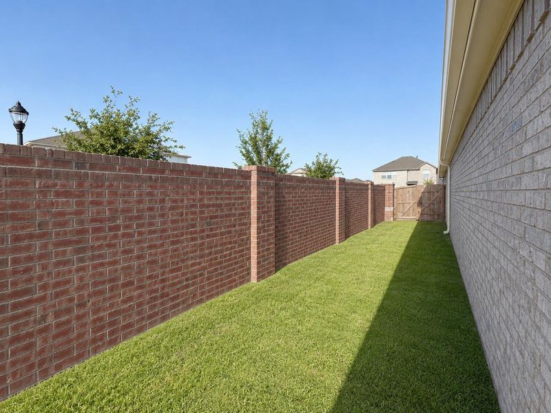 Exterior details and patio area of a home in , Katy (Image 28).