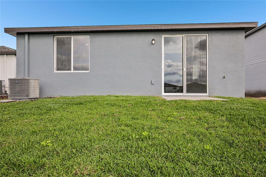 Exterior details and patio area of a home in Salt Meadows - Premier Series, Parrish (Image 18).
