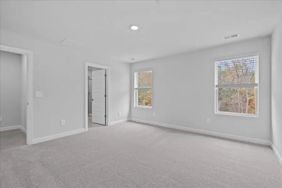 Spacious, unfurnished interior of a new home in Brayfield Manor - Heritage Collection, Wellford (Image 13).