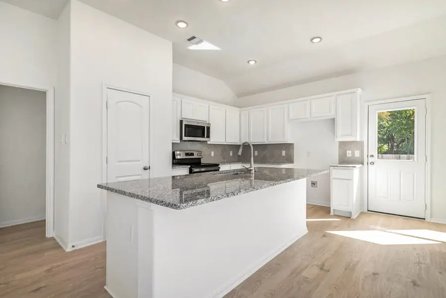 Furnished interior view inside a new home in Lake Conroe Hills, Willis (Image 2). Furnished interior view inside a new home in Lake Conroe Hills, Willis (Image 2).
