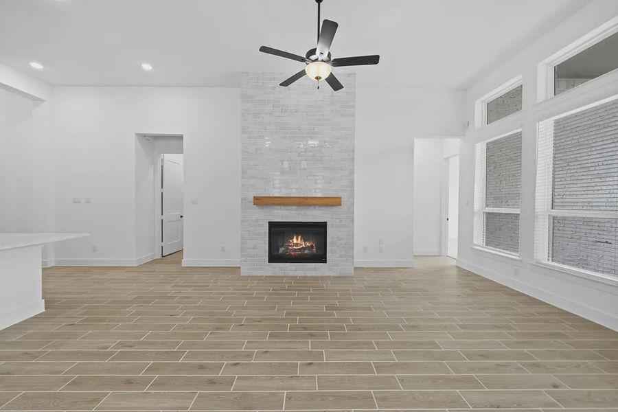 Representative unfurnished interior of a home built from the Summerton by Chesmar Homes in University Heights, Round Rock (Image 22).