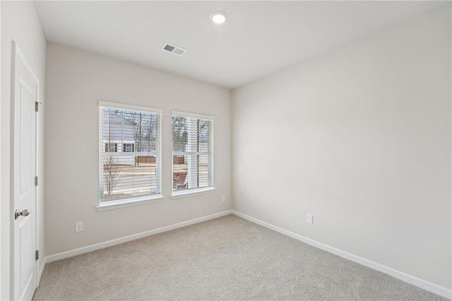 Spacious, unfurnished interior of a new home in Westmont Preserve, Powder Springs (Image 27).