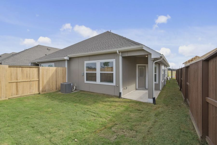 Representative exterior details of a home built from the Chalet by Chesmar Homes in Meridiana Townhomes, Iowa Colony (Image 4).
