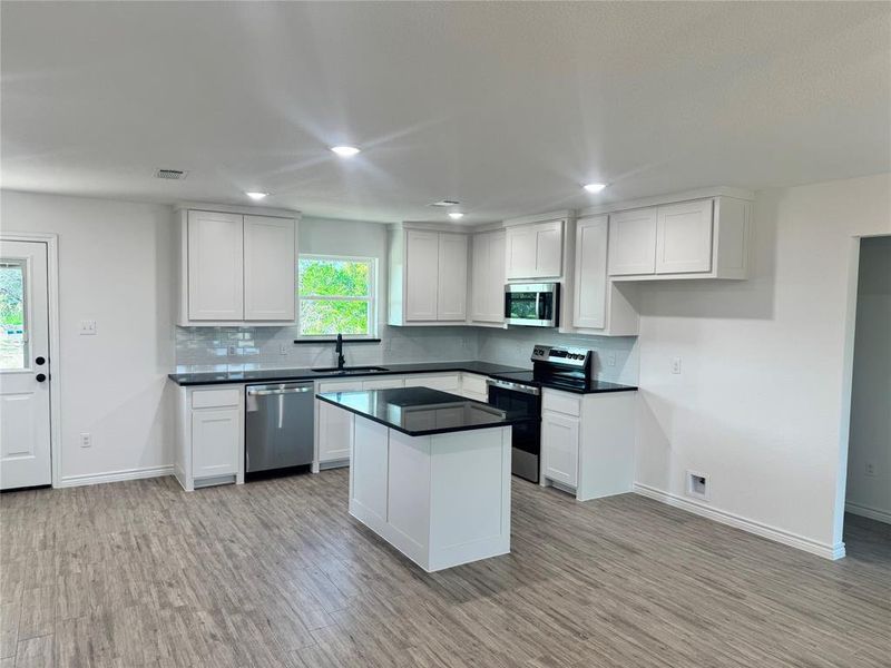 Furnished interior view inside a new home in Thomas Len Estates, Azle (Image 2). Furnished interior view inside a new home in Thomas Len Estates, Azle (Image 2).
