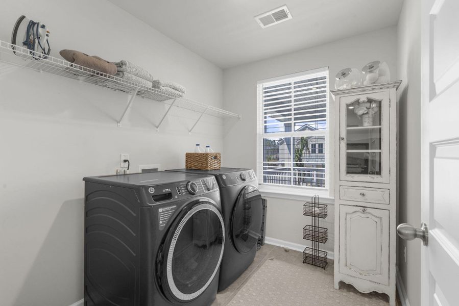 Furnished interior view inside a new home in Sweetgrass at Summers Corner, Summerville (Image 41).