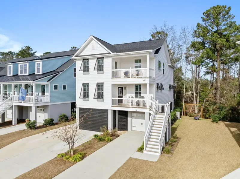 Front exterior of a new home in , Wando, SC, highlighting curb appeal (Image 2). Front exterior of a new home in , Wando, SC, highlighting curb appeal (Image 2).