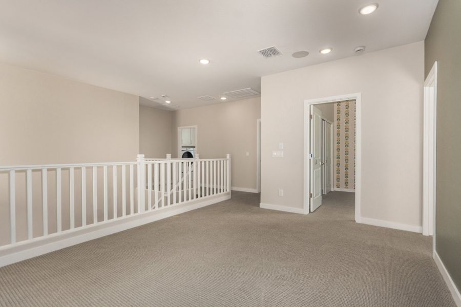 Spacious, unfurnished interior of a new home in Eastmark, Mesa (Image 11).