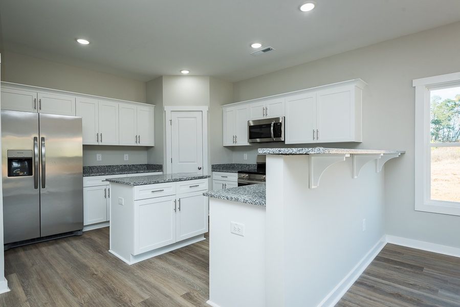 Representative furnished interior of a home built from the Brook C by Foundation Home Builders LLC in Pallini Place, Ossipee (Image 12).