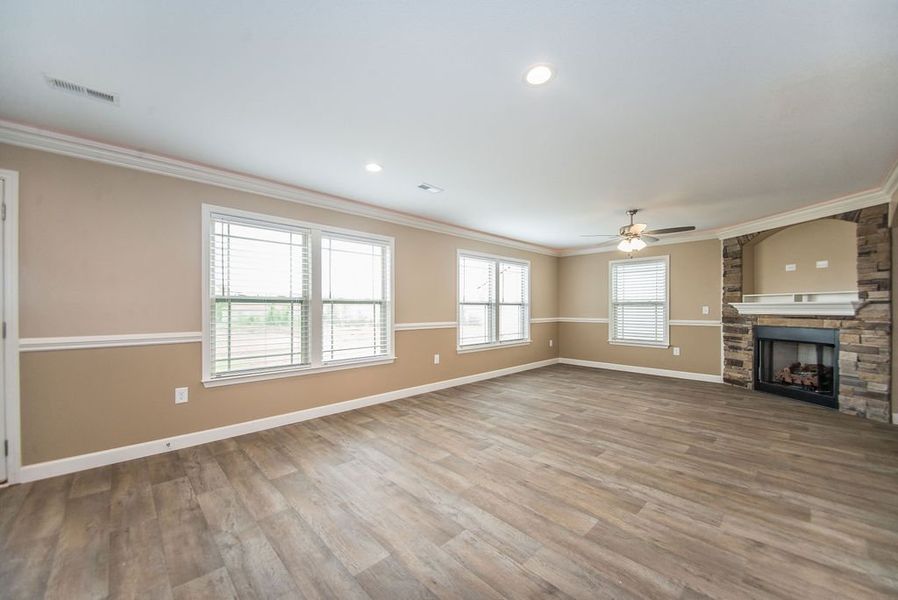 Representative unfurnished interior of a home built from the Reynolds by Enchanted Homes in Hampshire Heights, Moore (Image 24).