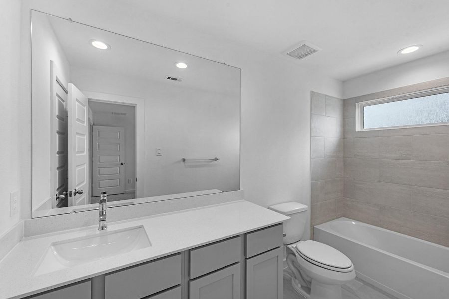 Furnished interior view inside a new home in Grand Mason Crossing, Katy (Image 11).
