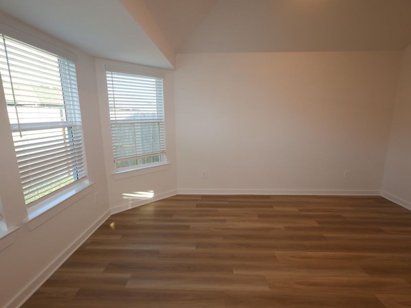 Spacious, unfurnished interior of a new home in Pinewood at Grand Texas, New Caney (Image 12).