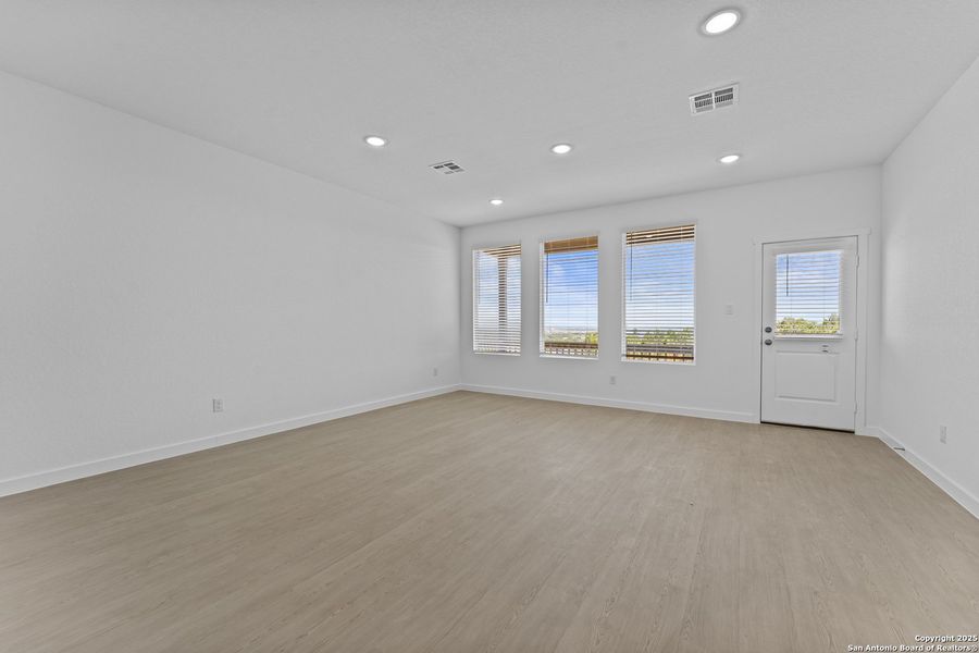 Spacious, unfurnished interior of a new home in Waterwheel: Coastline Collection, San Antonio (Image 16).