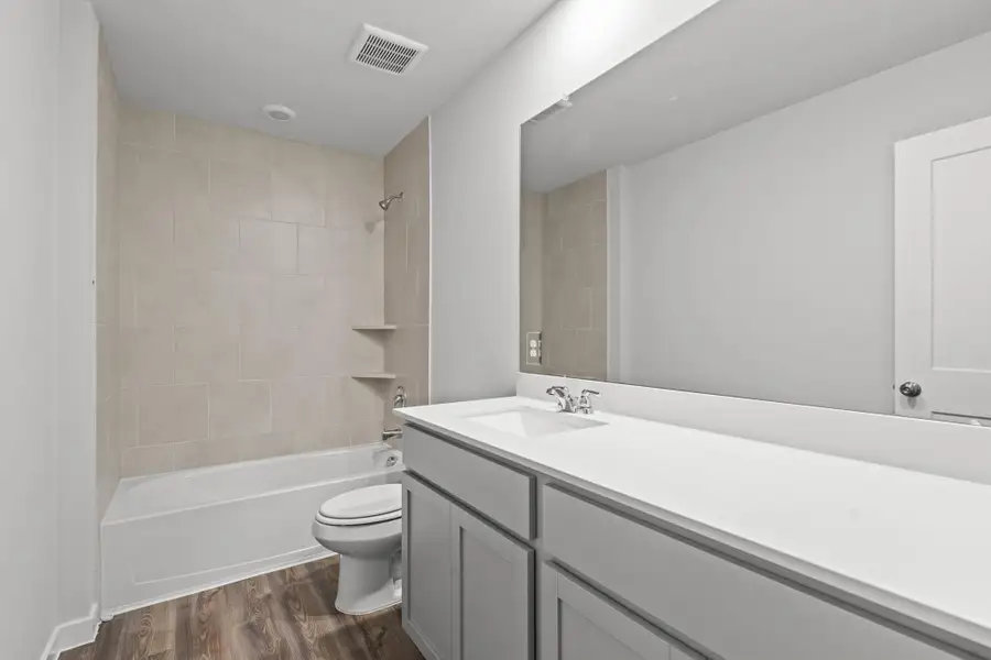 Furnished interior view inside a new home in Liberty Collection at Paloma at Sanford Farms, Waller (Image 5).