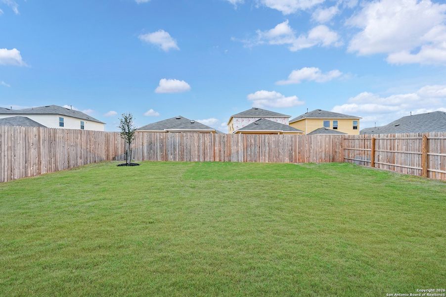 Exterior details and patio area of a home in Winding Brook, San Antonio (Image 23).