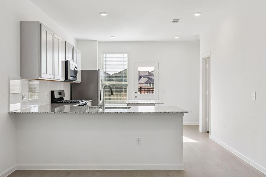 Furnished interior view inside a new home in Mavera, Conroe (Image 7).