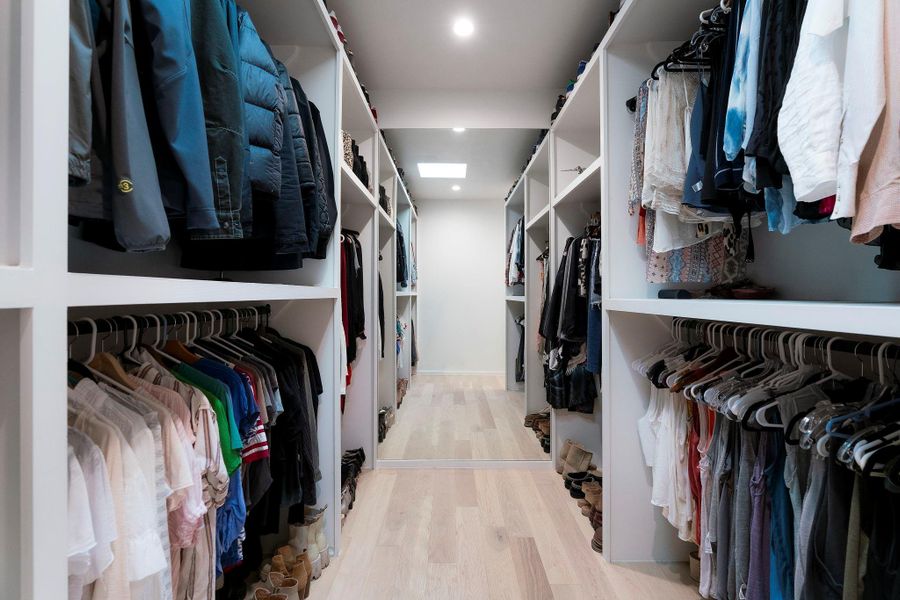 The dreamy oversized walk-in closet is a must see with extensive built-ins to help keep you will organized.