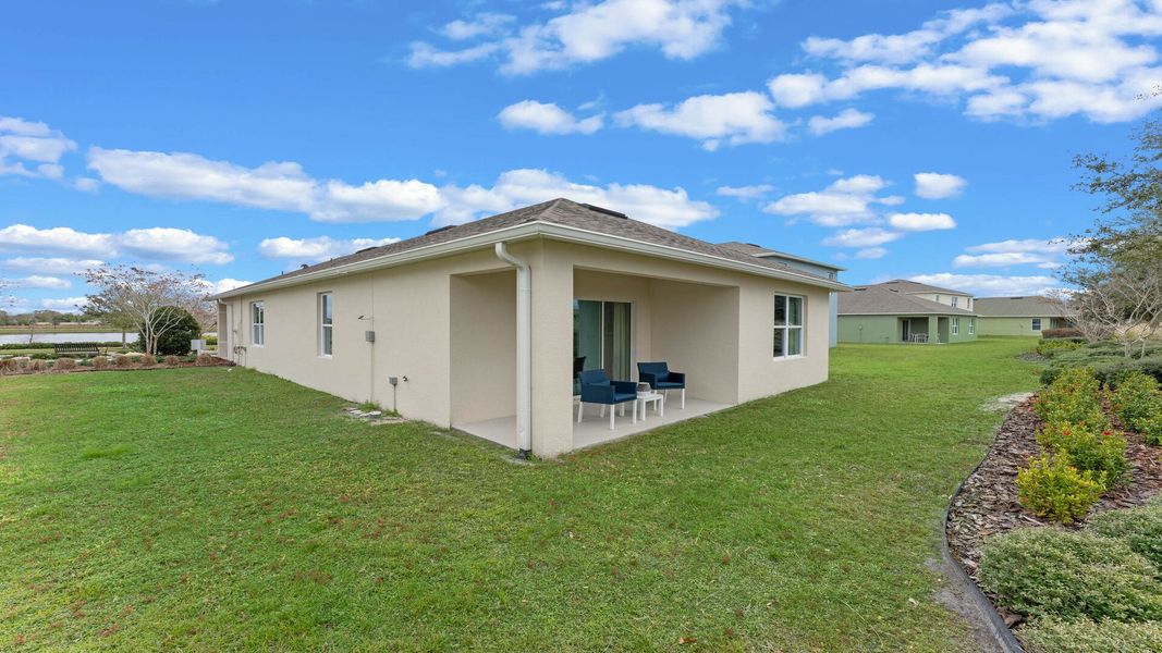Exterior details and patio area of a home in Kindred, Kissimmee (Image 4).